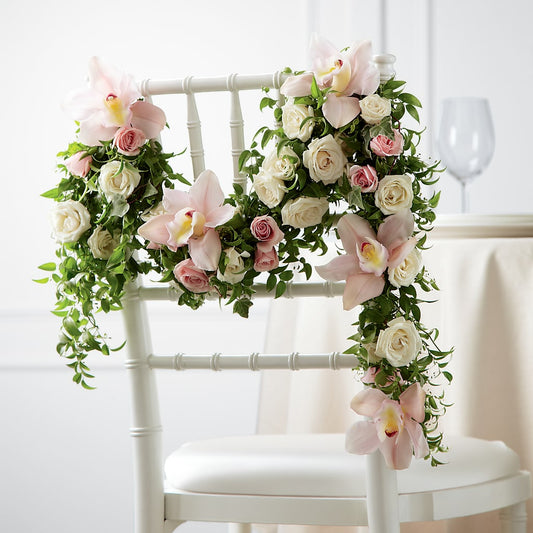 Orchid Rose Chair Décor – DE VARS-PHILLIPS FLORISTS & ANTIQUES, Hartford CT